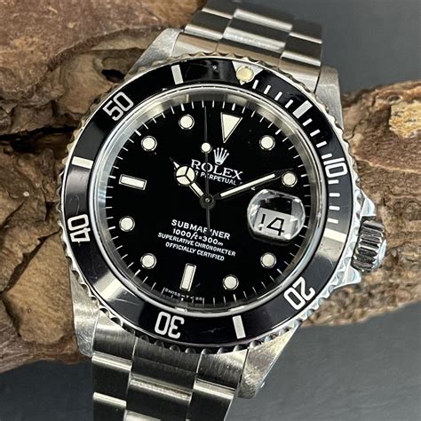 rolex submariner 16610 brown bazel